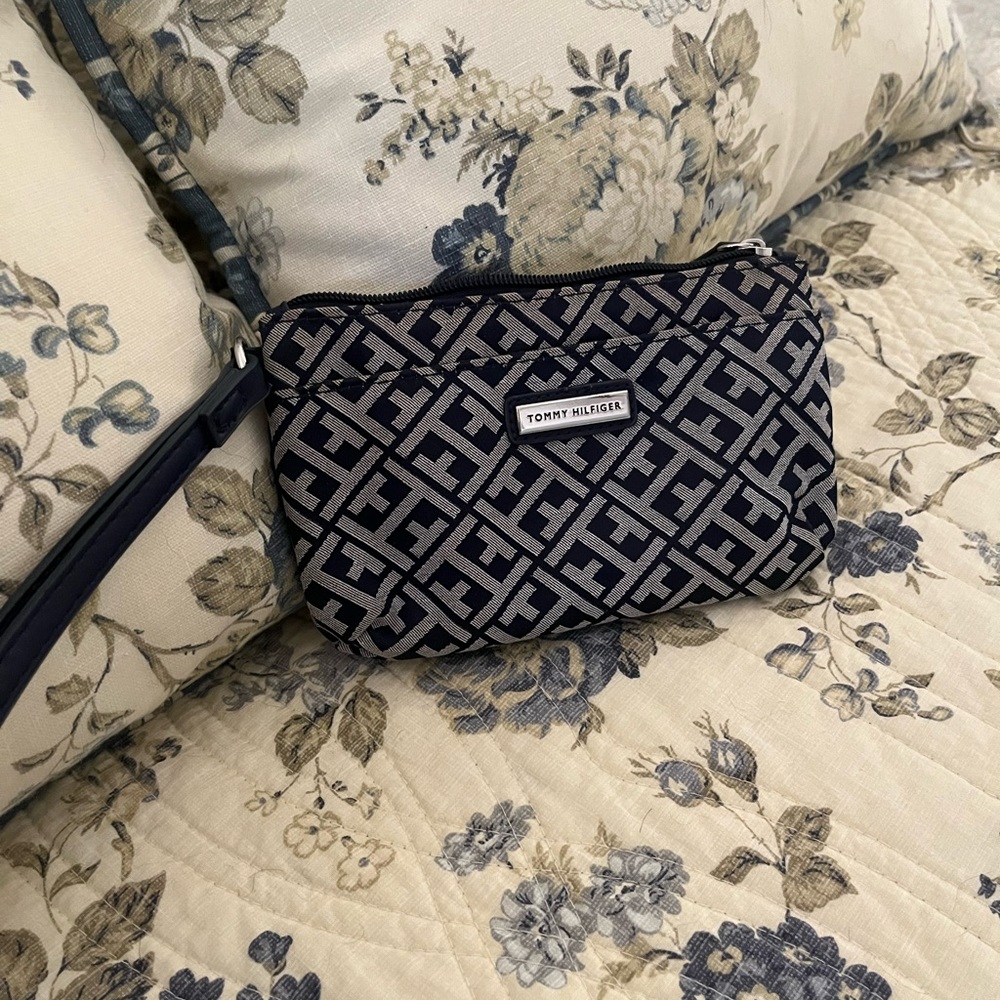 Wristlet fabric make-up purse in good condition. Owned by me, hardly used.